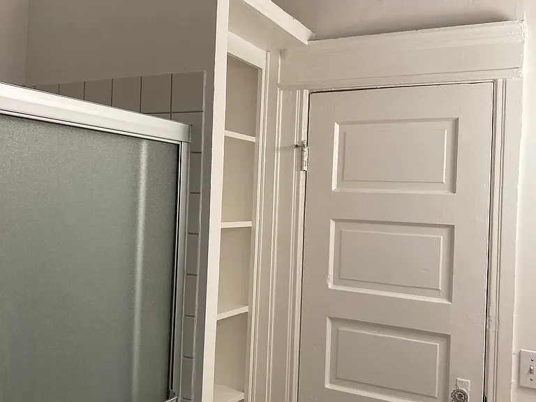 Storage behind bathroom door