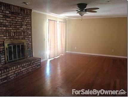 Massive living space
						:
						Beautiful hardwood floors and a wood burning fireplace make this a cozy room