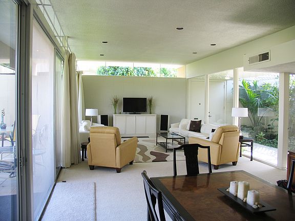 living area and tropical atrium