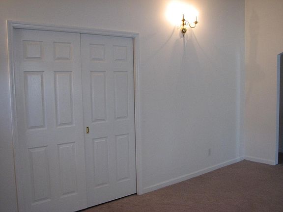Closed pocket doors to the 2nd Bedroom.