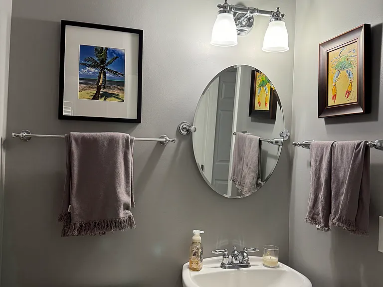 3rd Bathroom, connected to guest room and living room. This bathroom includes a large linen closet