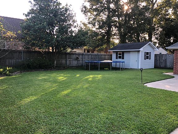 Fenced Back Yard with Shed