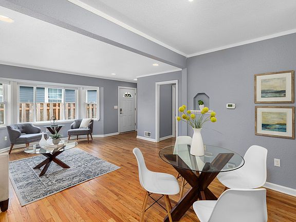 Photo of furnished unit next door for reference...living/dining
