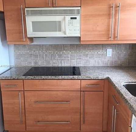 3rd image of 7891 Sunrise Lakes Dr N APT 303