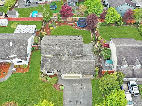 Aerial view of home and yard. 