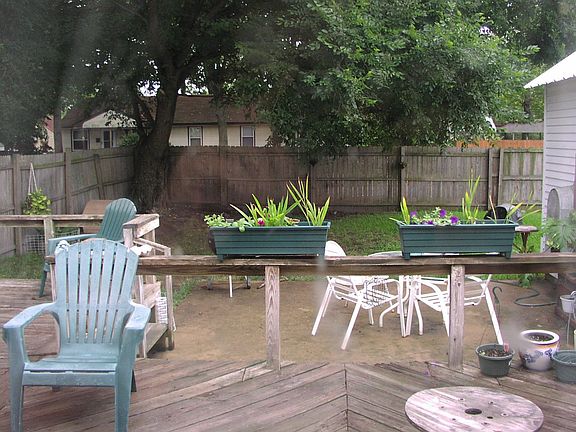 Deck with shaded backyard