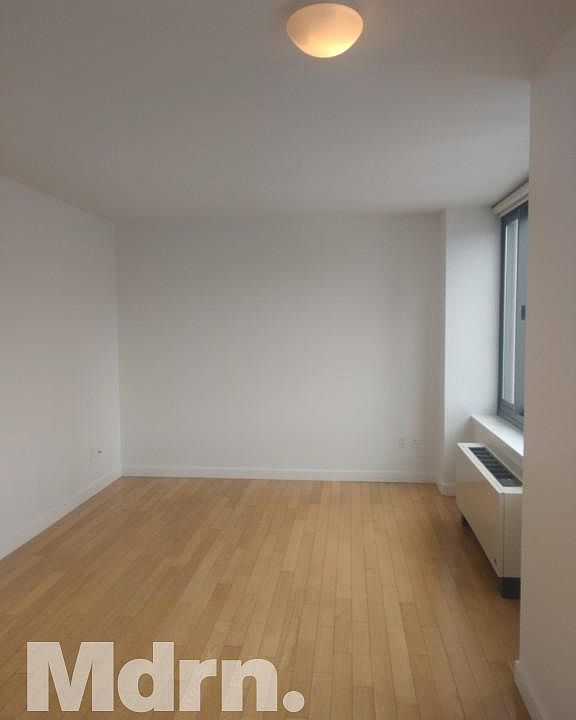 1st image of 9 W 31st St APT 36A