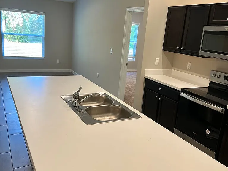 5951 NW Baynard Dr — Photo 9