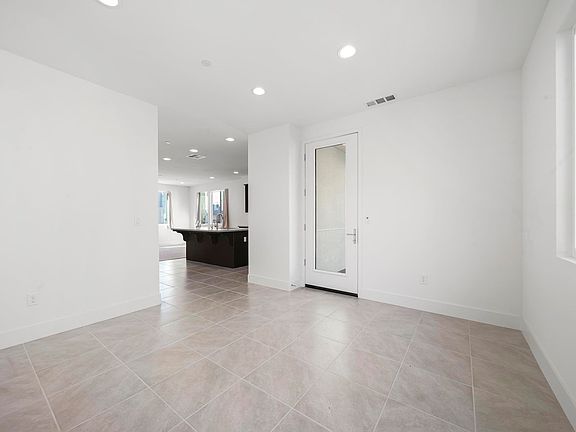 Attached dining room with balcony.