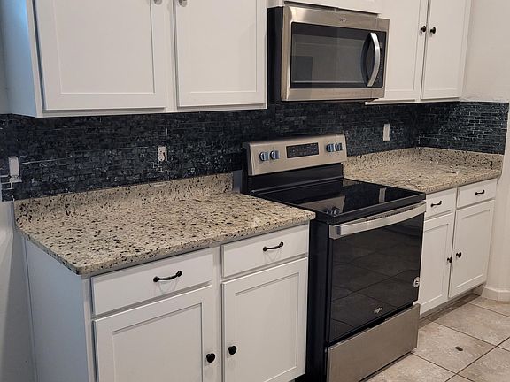5th image of 6360 NW Regent St