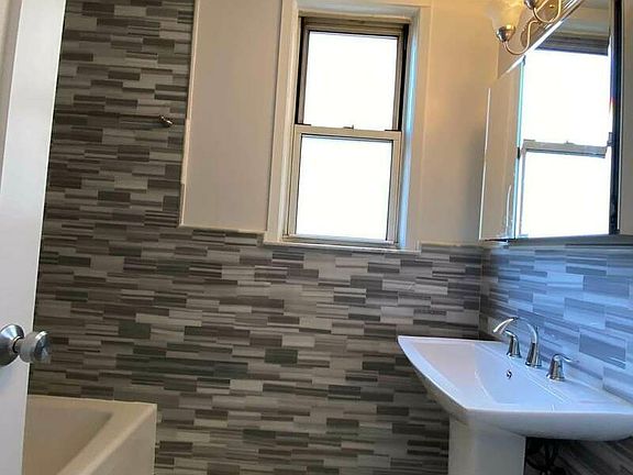 5th image of 245 E 19th St APT 11A