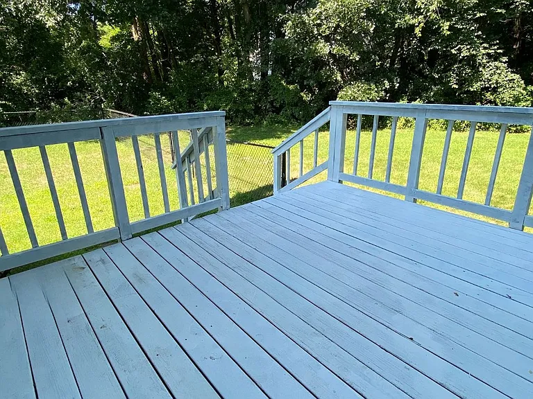 Private deck and shared backyard, however private fenced area for this unit off the deck.