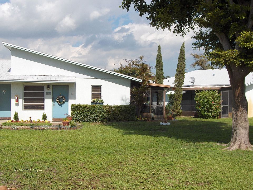 Front W/ Screened Patio