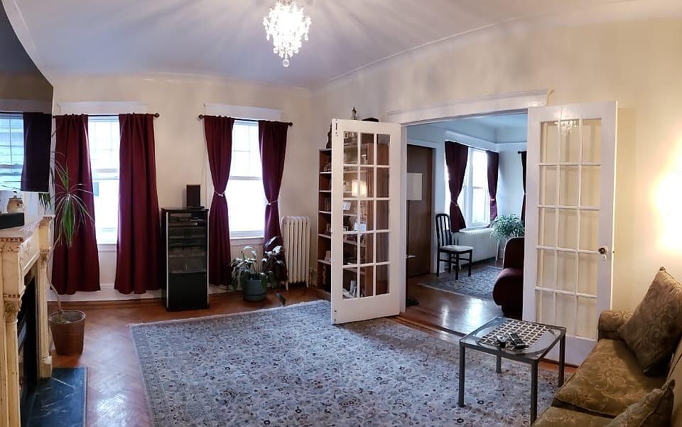 living room looking into french door facing master bedroom