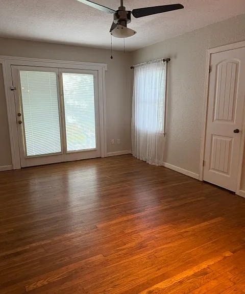 bedroom 3 or den with French doors and deck access
