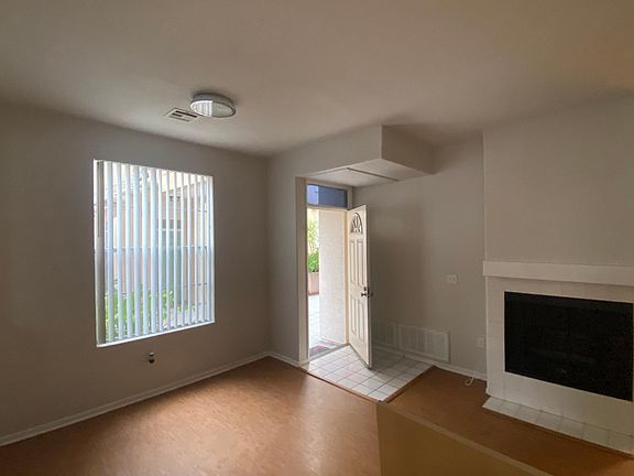 Front Entry with Living room & fireplace