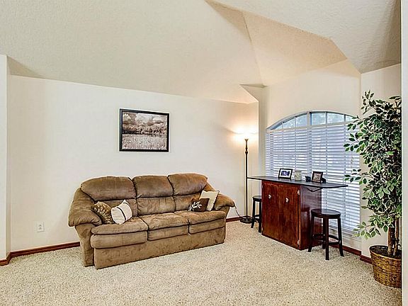Formal living area is a flexible space for entertaining, music or quiet enjoyment.