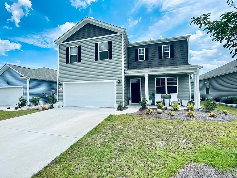 5043 Wavering Place Loop — Photo 1