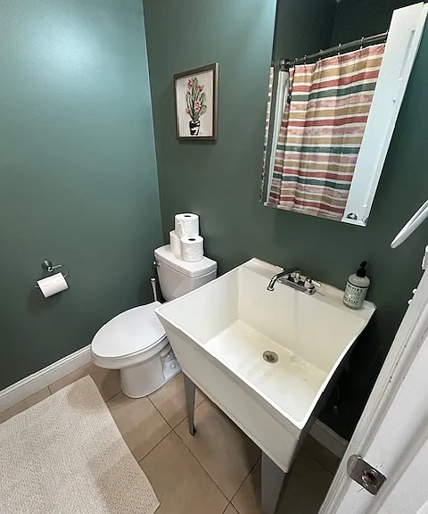 Bathroom with utility sink