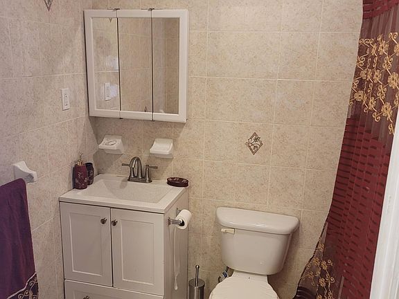 4th image of 834 E 218th St APT 1