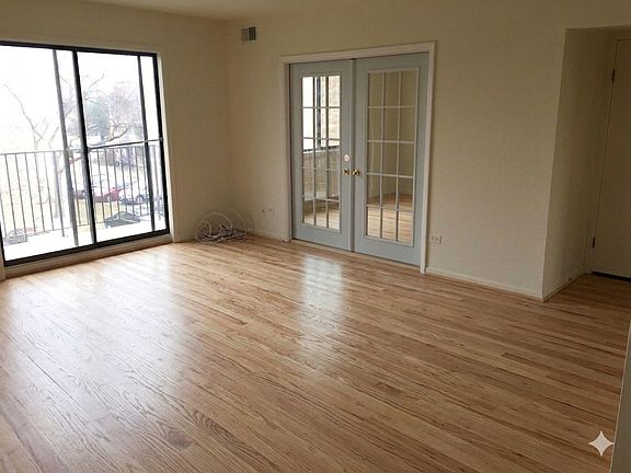 Living Room - since this photo we added new vinyl flooring. New heat and new AC in 2025