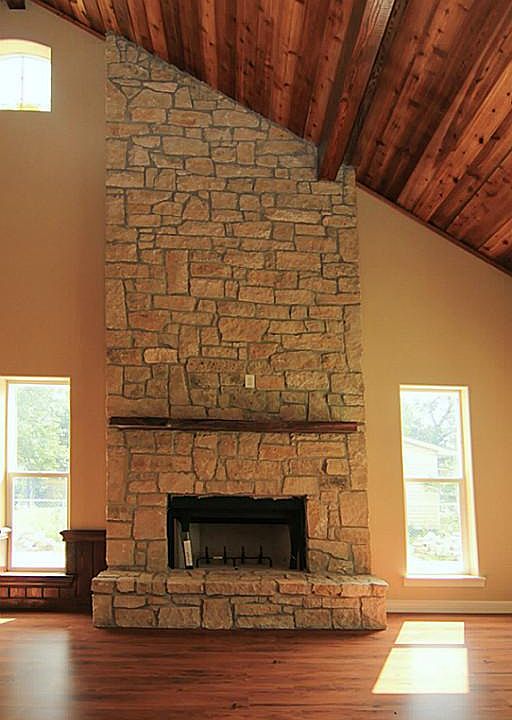 Beautiful fireplace and high ceilings