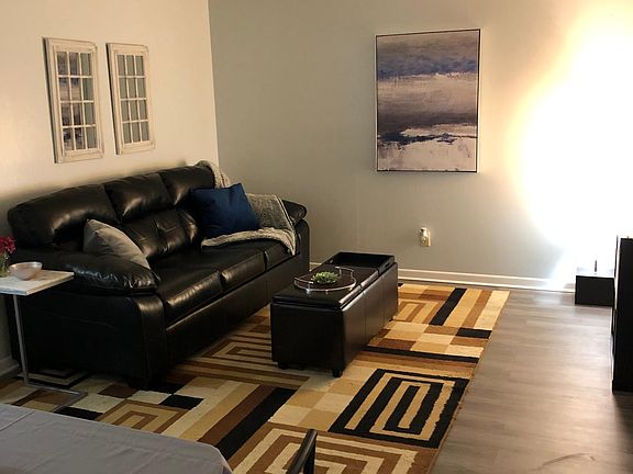 Cozy couch to lounge on while you stream your favorite shows on the smart TV.