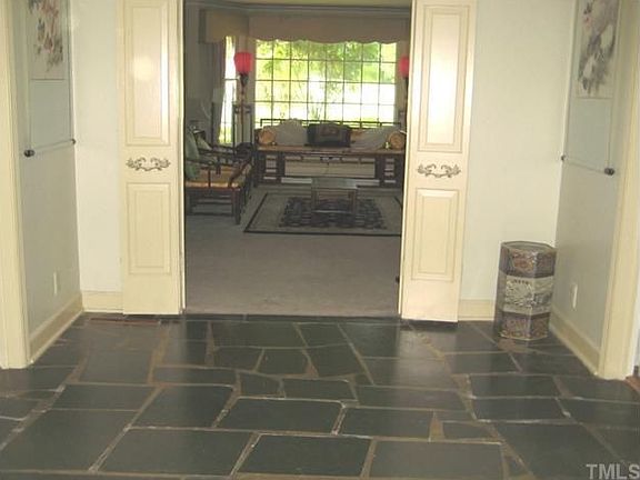 Spacious foyer with slate floor invites you in.