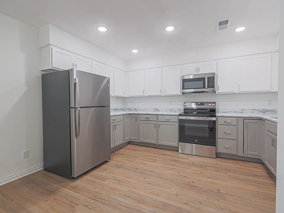Open Kitchen Area with expansive cabinetry makes it ideal for storage.