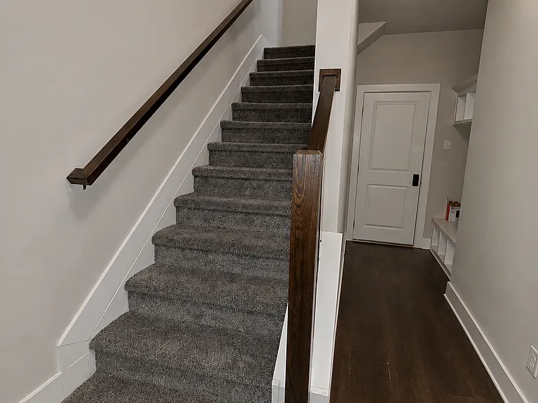 bottom level entryway and staircase to main level