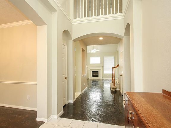 Open entry makes a great first impression. Second floor walkway adds to the spacious feel.