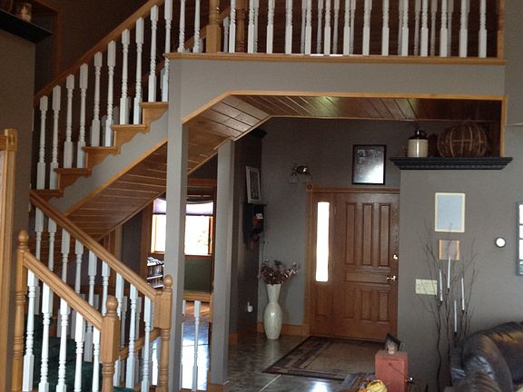 Foyer with open stair case