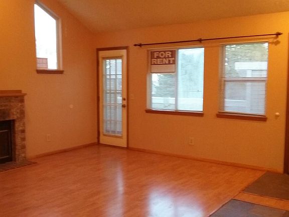 Living room and door/window to front patio