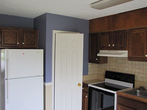 Kitchen: ceramic top stove, pantry, fridge