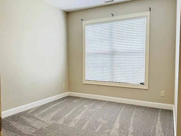 Big window in the first floor bedroom
