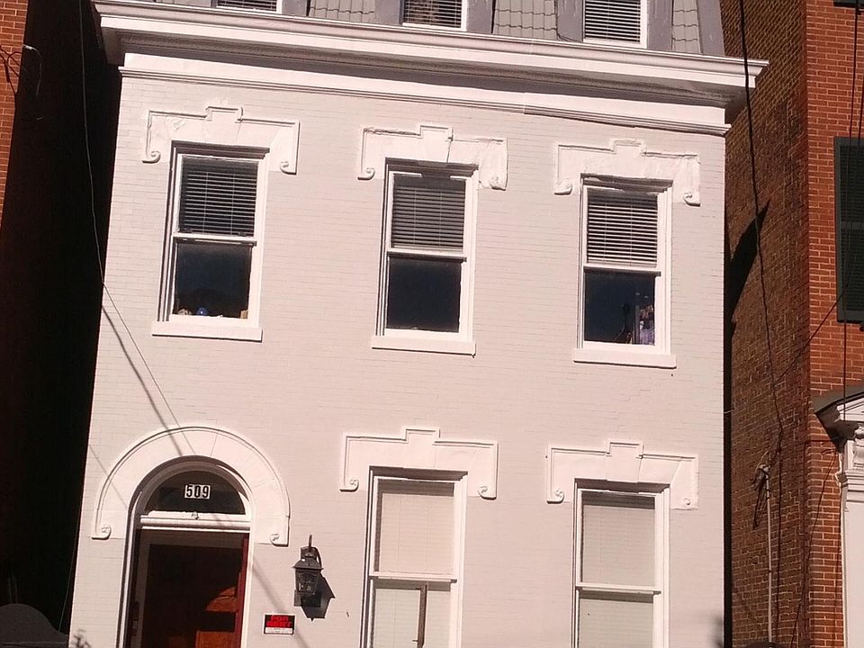 Townhome exterior with apartment units.