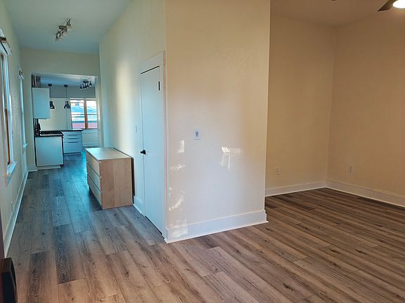 Step inside the unit and you'll be in the living room with quick access to the coat closet, and with a full-length view into the kitchen.
