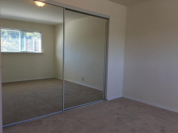 bedroom (mirrors are the closet)