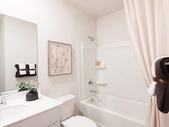 The downstairs full bedroom and bathroom are perfect for a guest suite.