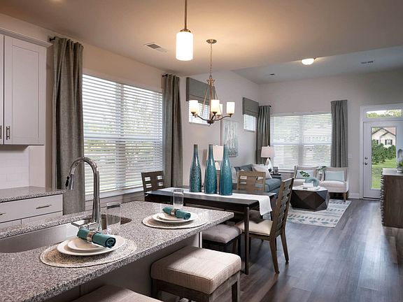 Gather around the kitchen island while drinking coffee in the mornings.