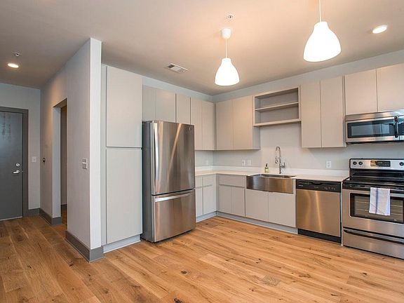 Stainless steel appliances and quartz countertops