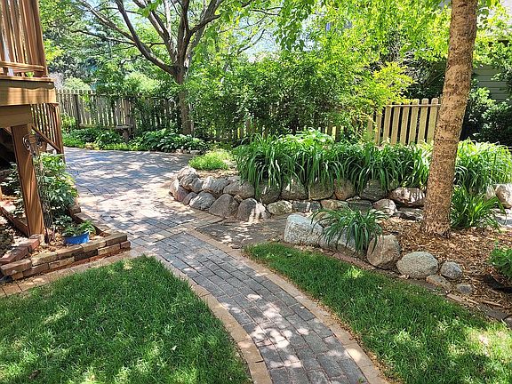 Brick path to back yard.
