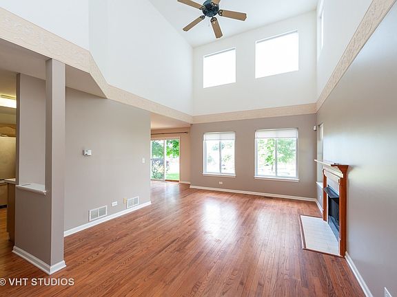 2 story family room, loads of light and a fireplace