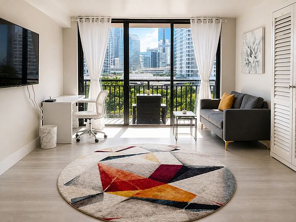 Bright living space setup with dedicated work-from-home nook