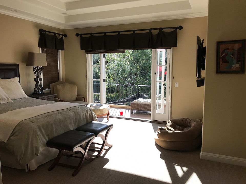 Master bedroom with balcony 