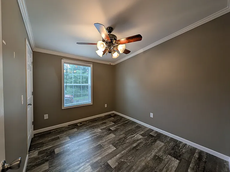 Smaller 3rd bedroom w window ceiling fan and closet