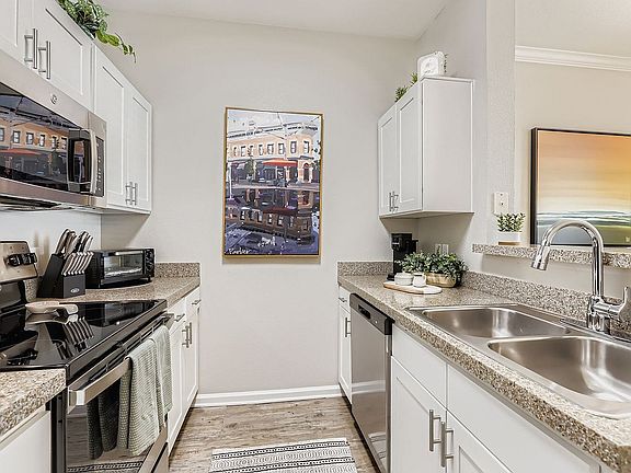 Sleek kitchen with stainless steel appliances