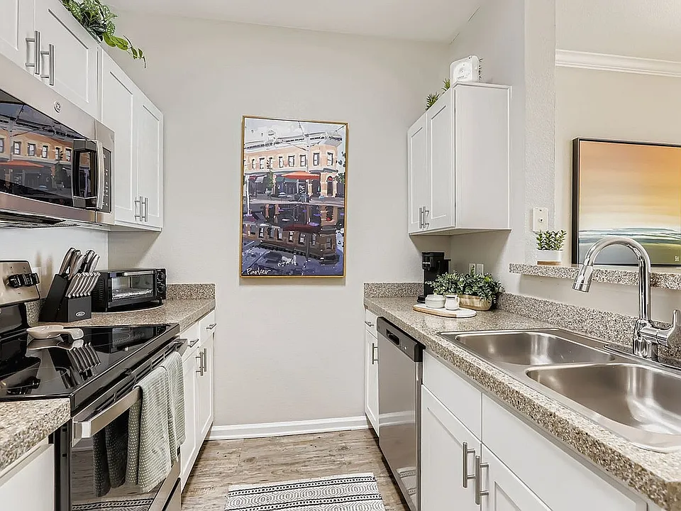 Sleek kitchen with stainless steel appliances