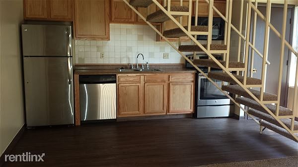 Modern and updated kitchen with stainless steel appliances.