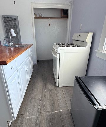 small closet , range/oven, microwave and refrigerator